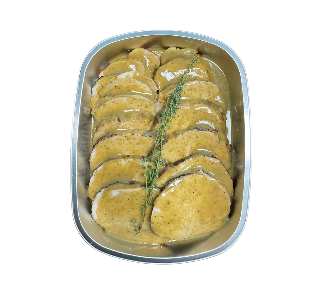 {'en_US': 'Pechuga de pavo al vino rebanada con su gravy'}