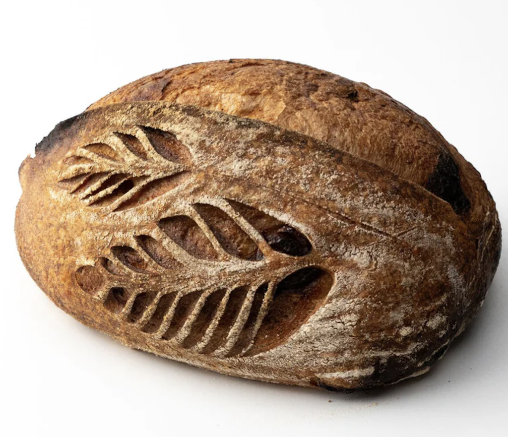 {'en_US': 'Con olor a Pan de cranberry y nueces 1kg'}