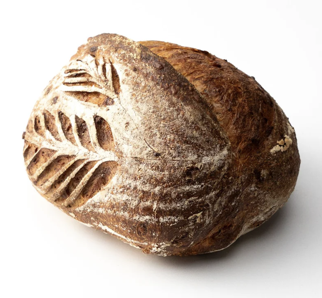 {'en_US': 'Con olor a pan masa madre integral 800g'}